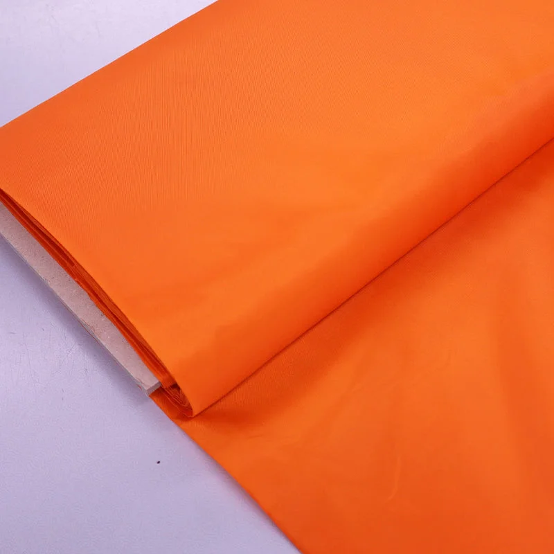 Dressmaking Anti Static Polyester Lining Fabric - Orange Tunics Formal black